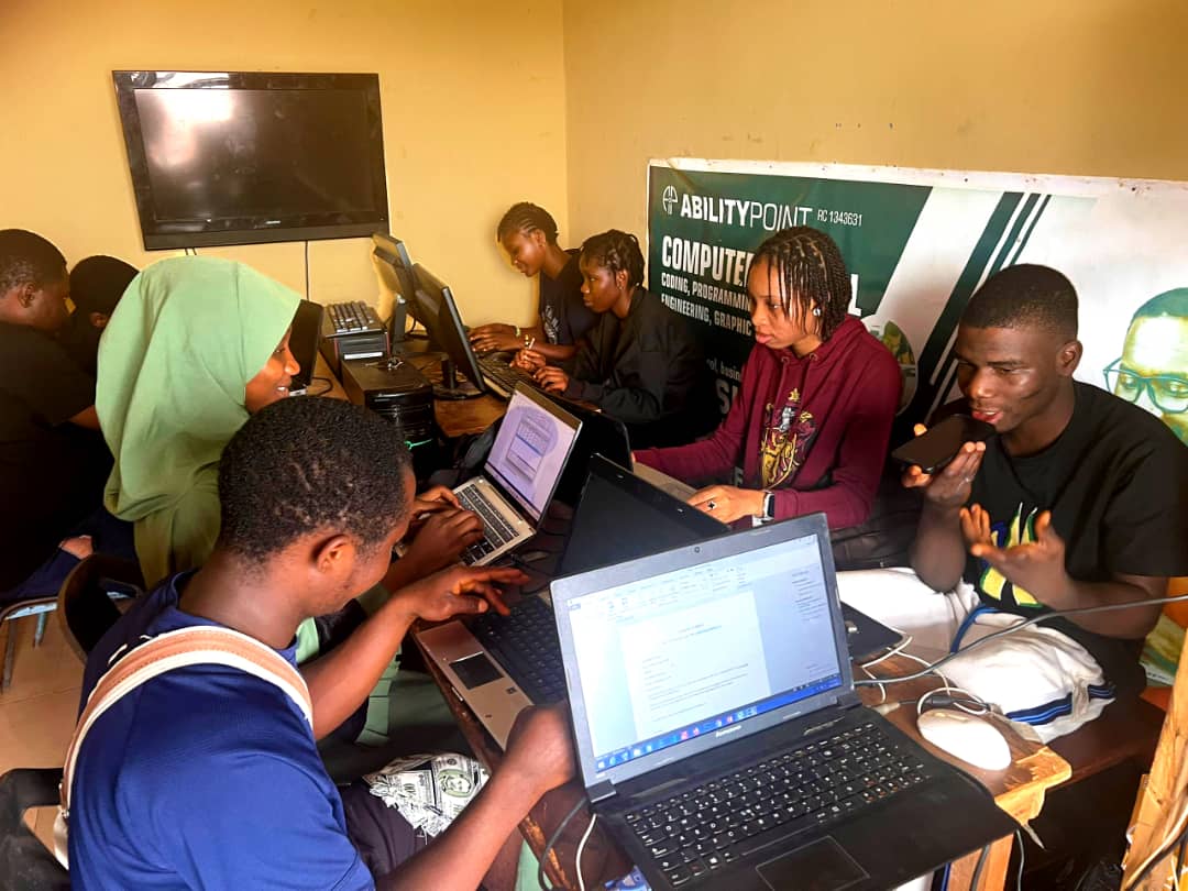 Students learning computer skills