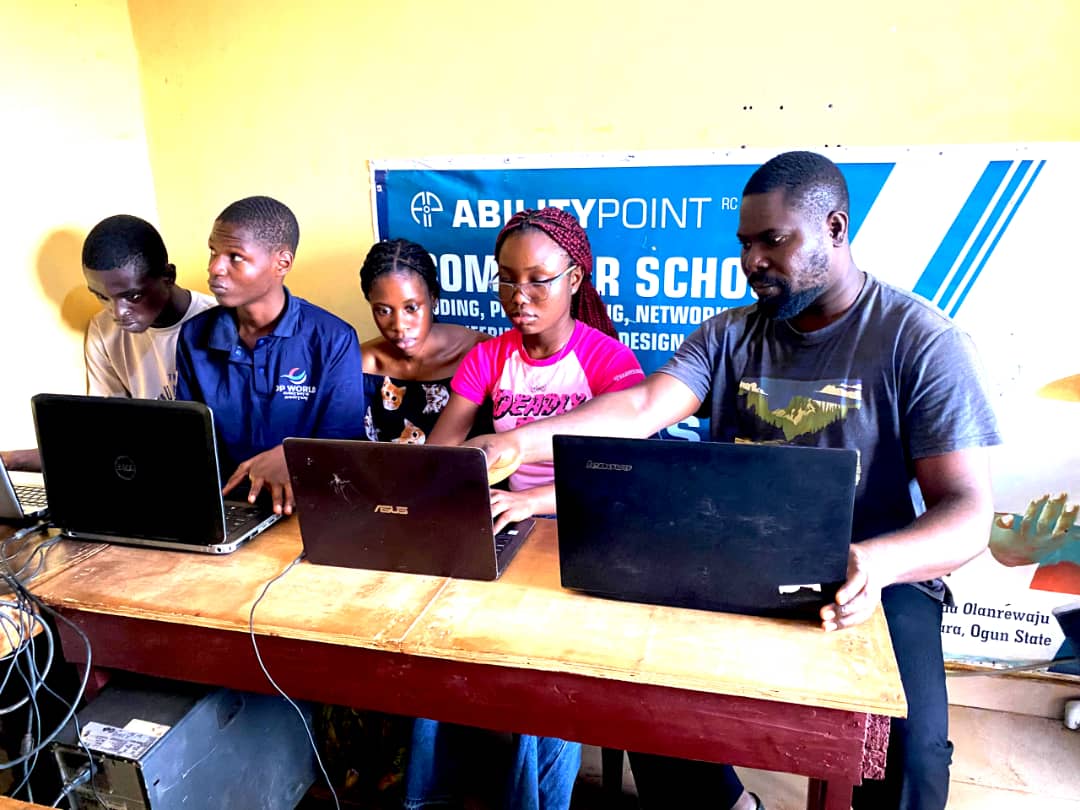 Students learning computer skills