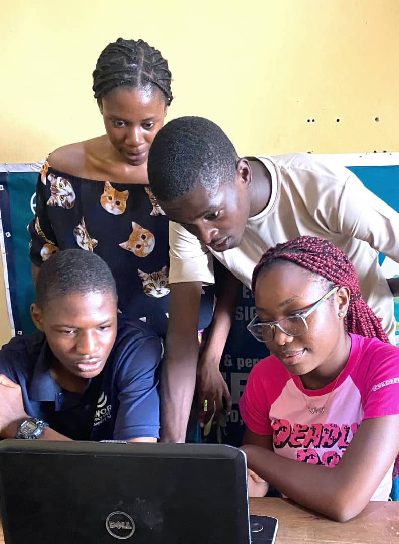 Students learning computer skills